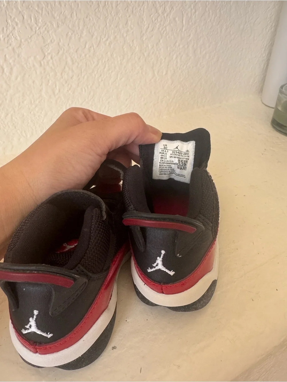 Kids Jordan Black and Red Basketball Sneakers
